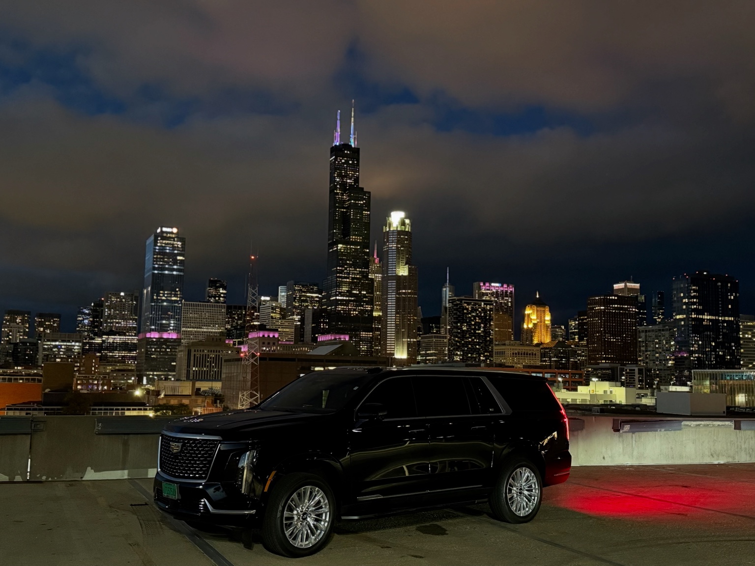 Cadillac Escalade with Chicago skyline